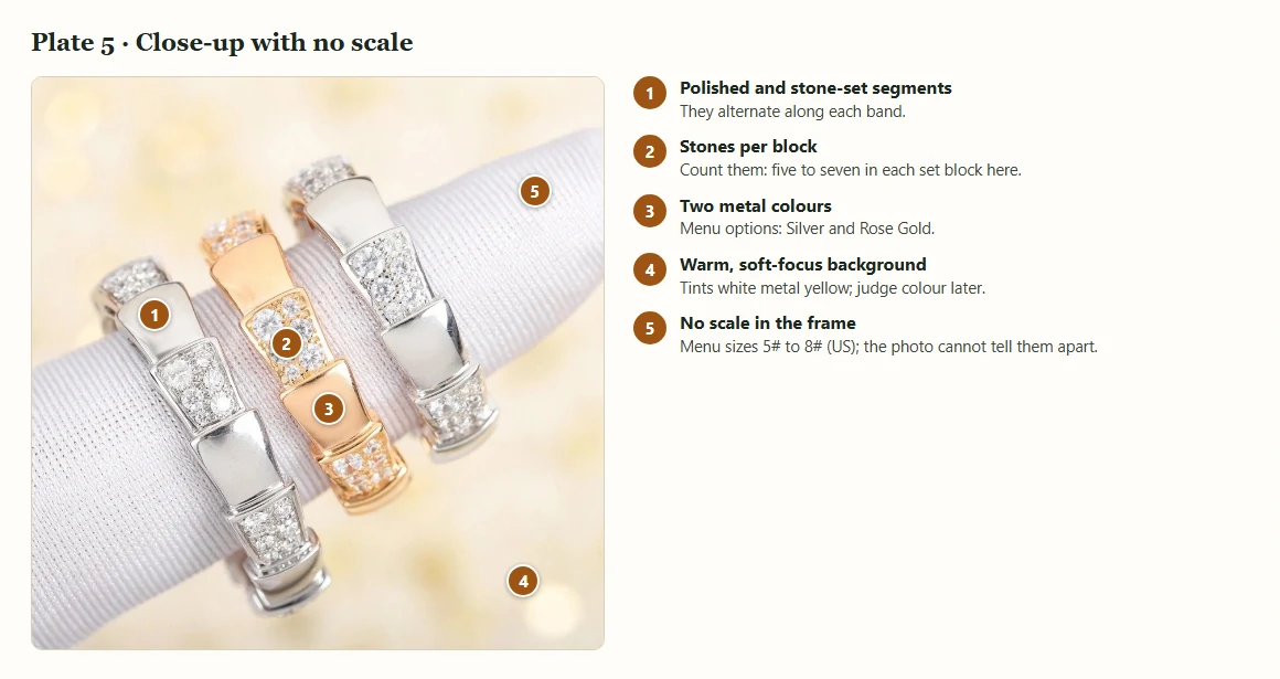 Three stacked rings, two silver-toned and one rose-toned, on a white fabric cone against a blurred warm background, with five numbered markers
